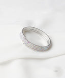 AYA Silver Coil Bangle With Clear Rhinestones